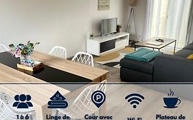 Maison Mitoyenne avec cour + parking